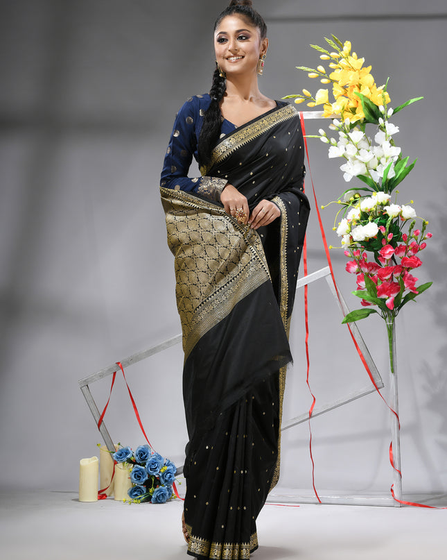 Model showcasing black Banarasi Kanjivaram wedding saree.