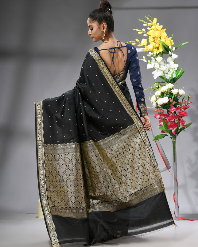 Back view of a graceful black Kanjivaram silk saree.