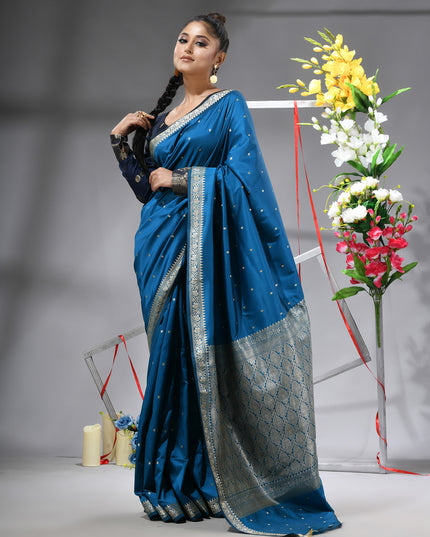 Elegant blue Kanchipuram silk saree with intricate jacquard weave.