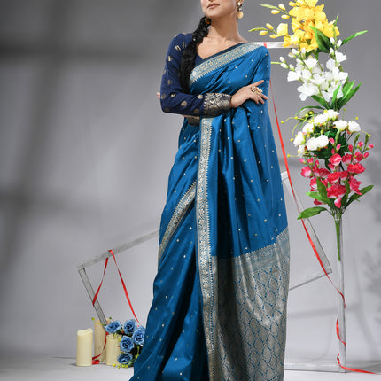 DESH BIDESH Blue Kanjivaram silk blend saree with silver zari butti.
