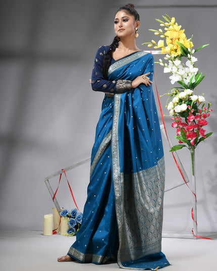 DESH BIDESH Blue Kanjivaram silk blend saree with silver zari butti.