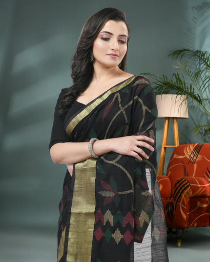 Close-up of Floral Leaf Design on Black Cotton Silk Saree
