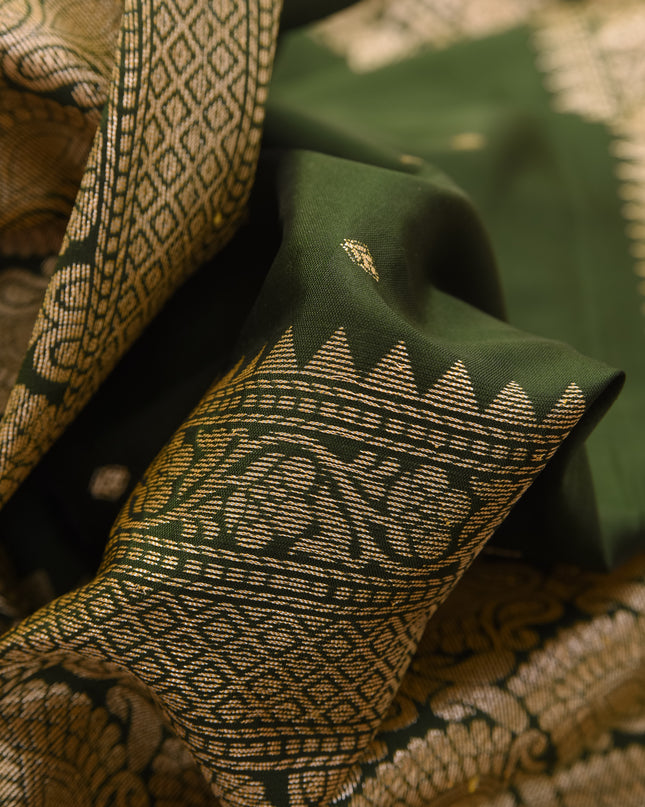 Authentic Kanchipuram design on a dark green modern silk saree border details