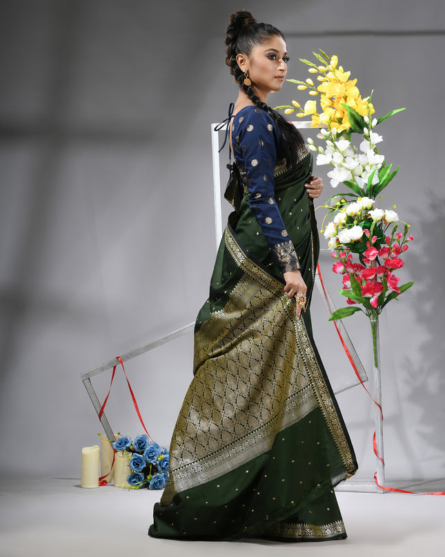 High-quality dark green silk blend saree for special events.