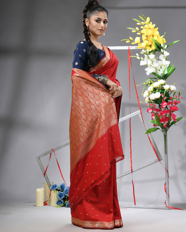 Vibrant red Indian wedding saree in Kanjivaram style.

