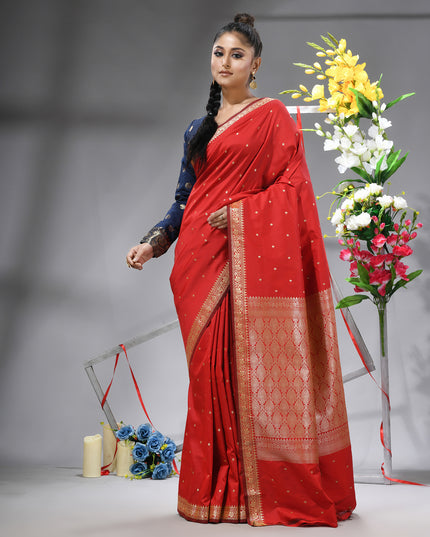 Stunning red Kanchipuram silk saree with intricate jacquard weave.