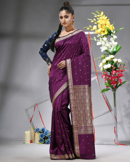 Model showcasing Magenta Purple Banarasi Kanjivaram wedding saree.
