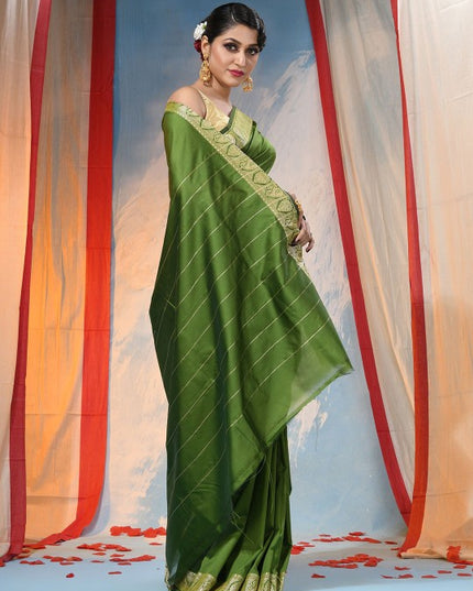 Exquisite Green Woven Zari Silk Blend Saree with Blouse Piece