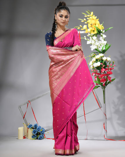 Soft silk pink saree with rich jacquard patterns for festive occasions.