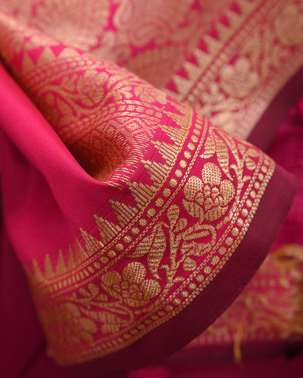 Close-up of the pallu design on DESH BIDESH pink silk saree.