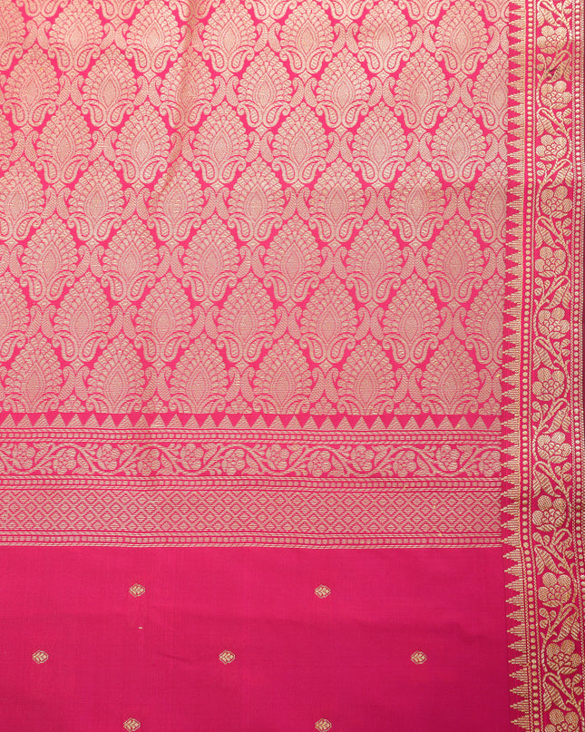 Bridal pink silk saree with intricate silver zari butti work.