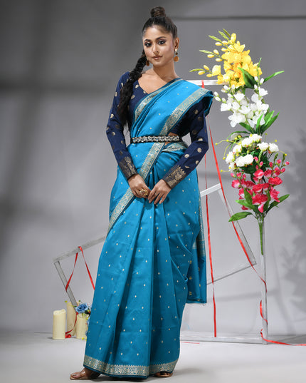 Model showcasing sea blue Banarasi Kanjivaram wedding saree.