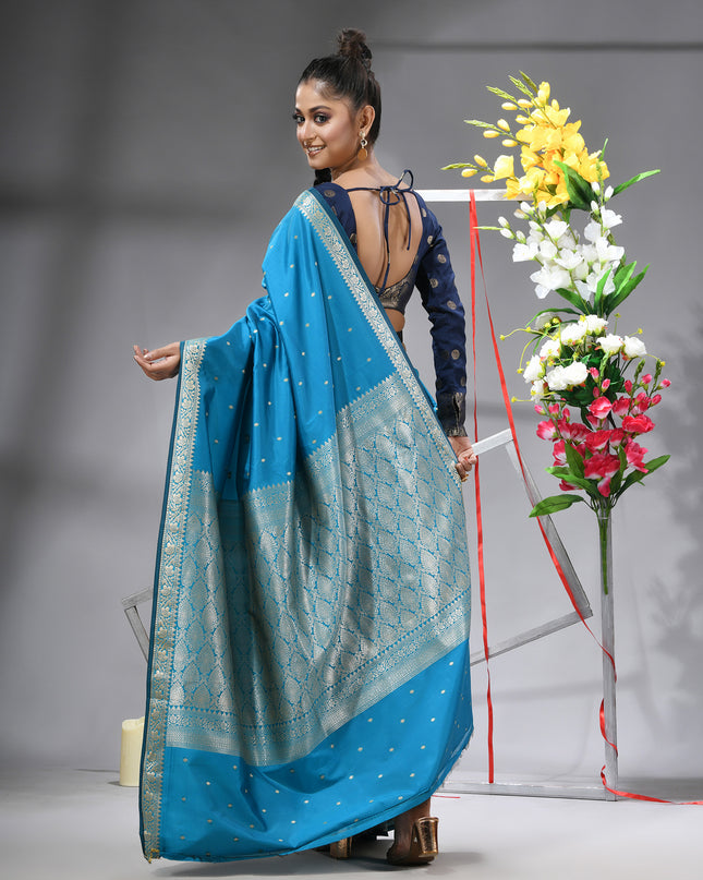 Stunning sea blue Indian wedding saree in Kanjivaram style back view
