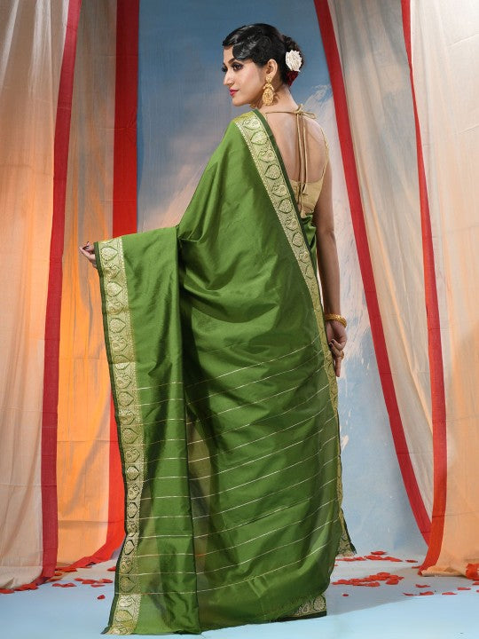 Exquisite Green Woven Zari Silk Blend Saree with Blouse Piece