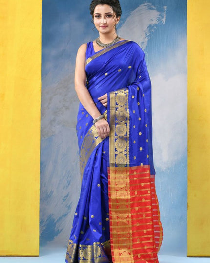Exquisite Royal Blue Woven Design Zari Kanjeevaram Saree with Blouse Piece
